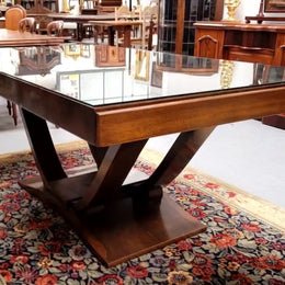 French Art Deco Figured Walnut dining table and six chairs. This stylish table also comes with a glass top and can be used with or without it. The chairs are very comfortable and the table can also fit another two chairs at either end making it a 6-8 seater. The table is in good original detailed condition with character marks to the top of table as shown in the pictures. This table and six chairs have been sourced locally.