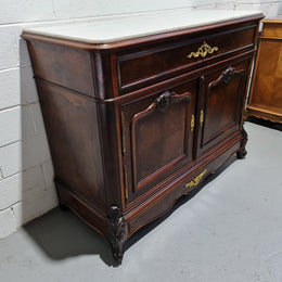 Stunning Rosewood Marble Topped Secretaire with two cupboards. Cupboards open to three fitted drawers and an additional secret drawer beneath the cupboard. All sitting on lovely carved legs and decorated with ormolu mounts. Circa: 1860. In good original detailed condition.