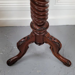 Rare early Victorian Irish Burr Walnut wine table. It has a beautiful carvings and a stunning burr walnut top, on a barley twist column and three shaped legs. It has been sourced locally and is in good original detailed condition. We also have a second table being sold separately which when together make a matched pair.
