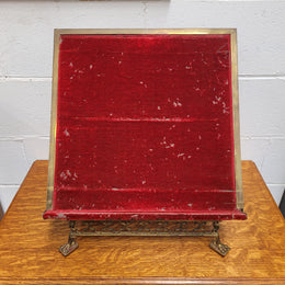 Antique French brass Gothic Revival book stand with red velvet. It has sourced from France and is in good original condition.