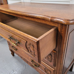 French Louis XV style Oak three drawer chest with wooden top. It has been sourced from France and is in good original detailed condition.