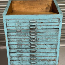 Fabulous set of vintage painted blue printers drawers that have adjustable separators which can be taken out for large papers. The drawers are various sizes and there is a section on top for working on or for storing brushes or tall items . These would be perfect for artists or jewellery pieces or even architects. Such a beautiful piece of industrial furniture.
