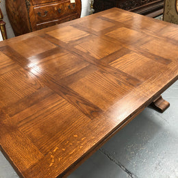A beautiful French oak, Spanish style parquetry top extension table, with amazing carving and lovely details in very good condition.