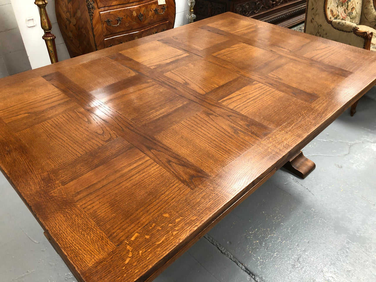 A beautiful French oak, Spanish style parquetry top extension table, with amazing carving and lovely details in very good condition.