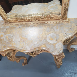 Beautifully carved Italian Rococo style painted console/hall table and mirror. An amazing coloured marble top showing sections of gold veins and is in good condition. Mantle mirror is retaining it's original mirror and showing ages spots.