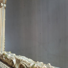 Beautifully carved Italian Rococo style painted console/hall table and mirror. An amazing coloured marble top showing sections of gold veins and is in good condition. Mantle mirror is retaining it's original mirror and showing ages spots.
