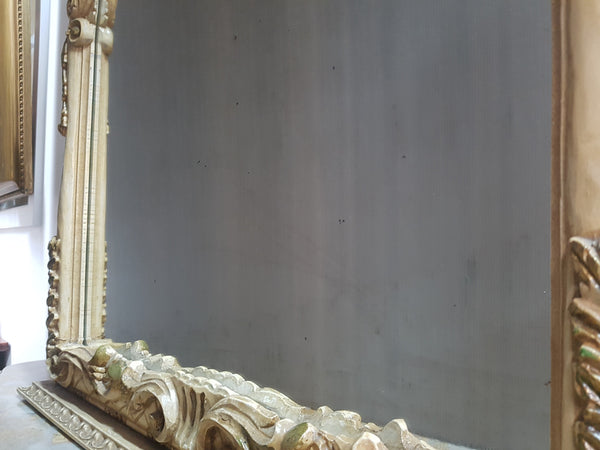 Beautifully carved Italian Rococo style painted console/hall table and mirror. An amazing coloured marble top showing sections of gold veins and is in good condition. Mantle mirror is retaining it's original mirror and showing ages spots.