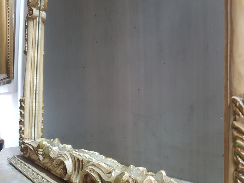 Beautifully carved Italian Rococo style painted console/hall table and mirror. An amazing coloured marble top showing sections of gold veins and is in good condition. Mantle mirror is retaining it's original mirror and showing ages spots.