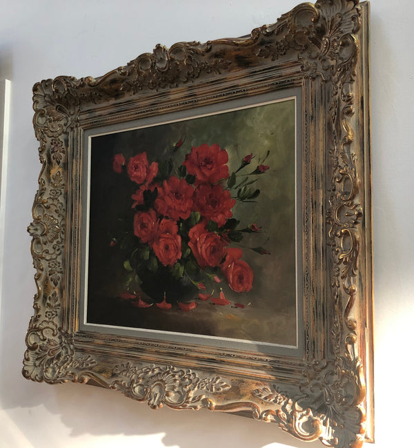 Lovely French oil on canvas of red roses in a beautiful ornate frame. In good original detailed condition.