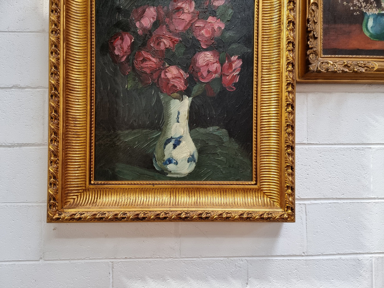 French floral signed oil painting of flowers in a vase in a stunning gilt frame. In good original condition.