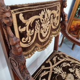 Beautifully carved Walnut Egyptian Revival armchair with amazing hand sewn Stumpwork embroidery coverings. In good original detailed condition.
