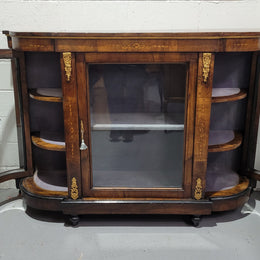 Victorian Rosewood inlaid side cabinet/credenza with velvet lined shelves and gilt mounts. It has been sourced locally and is in good original condition with loads of character.