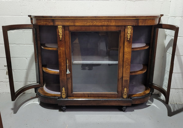 Victorian Rosewood inlaid side cabinet/credenza with velvet lined shelves and gilt mounts. It has been sourced locally and is in good original condition with loads of character.