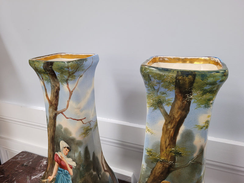 Pair of Victorian hand painted decorative vases depicting women. Please view photos as they help form part of the description.