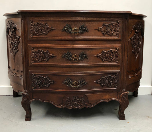 French Louis XV style dark Oak carved, two door and three drawer Commode /side cabinet. Could also be used as a TV cabinet or in the bedroom as storage very versatile. In good original detailed condition.