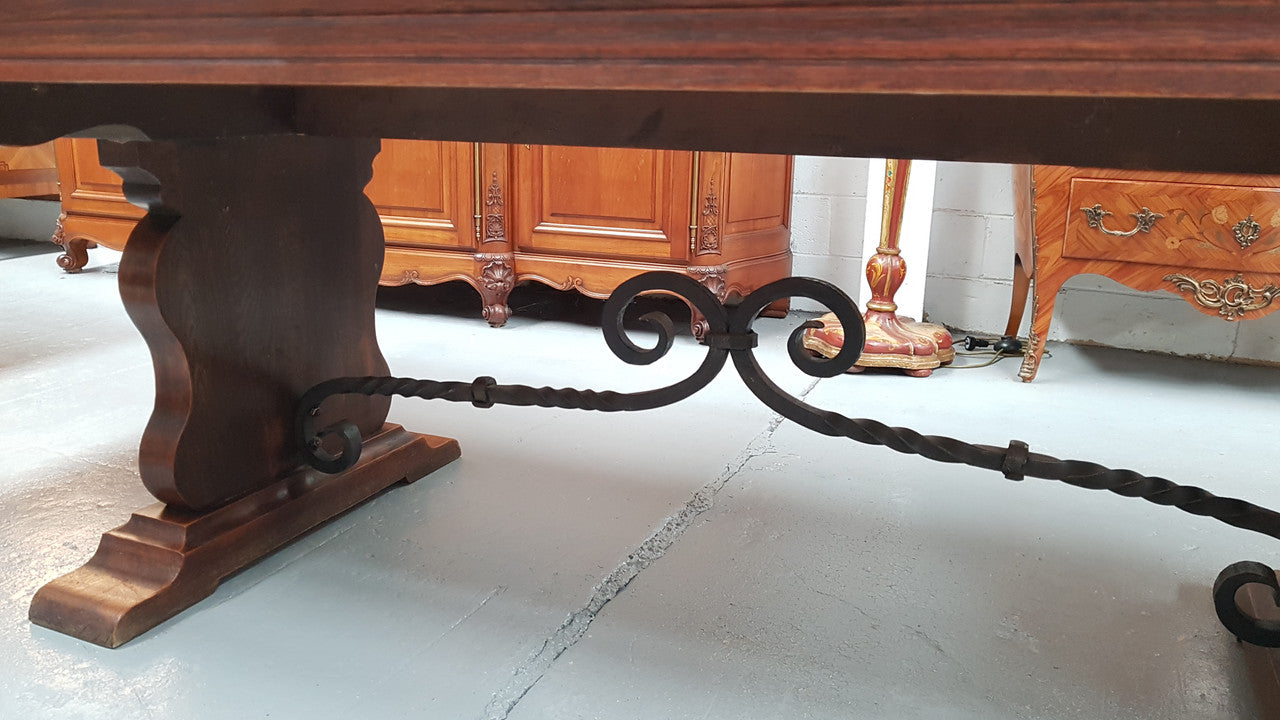 A beautiful French oak, Spanish style parquetry top extension table, with amazing carving and lovely details in very good condition.