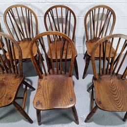 Beautiful set of 8 English oak cottage dining chairs with loads of character. In very good original detailed condition.