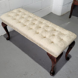 Vintage neutral upholstered buttoned stool. Fabric is in good used condition, please view photo's has they help form the description. The stool its self is in good condition.
