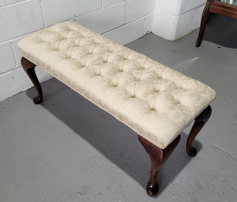 Vintage neutral upholstered buttoned stool. Fabric is in good used condition, please view photo's has they help form the description. The stool its self is in good condition.