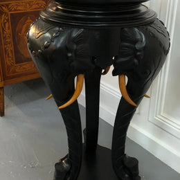 Fabulous French ebonized Elephant pedestal /plant stand with lovely carved detail and in good original detailed condition.