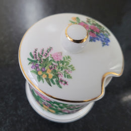 Fortnum & Mason Piccadilly London England floral decorated covered honey/jam pot. It is in good original condition with no chips or cracks, please view photos as they help form part of the description.