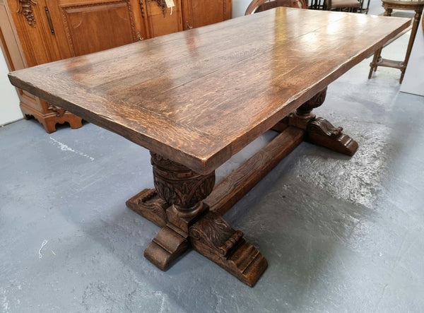 A beautifully carved 19th Century French Oak farmhouse table with a "bulbous base". It is in very good original detailed condition.