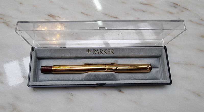 Parker 22 carat gold plated ball point pen in its box.