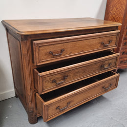 French solid Oak Louis 14th style chest of three drawers. It has three large spacious drawers and it has been sourced from France. It is in good original detailed condition.