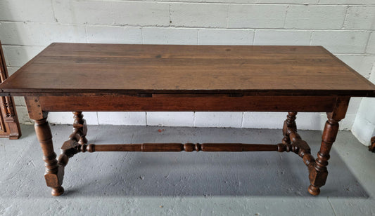 Appealing and rare French Oak Farmhouse extension table. Charming character to the top and comfortably seats 12 people. In good original detailed condition.