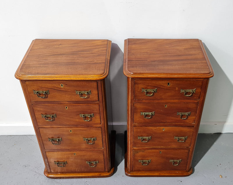 Pair of English Victorian Mahogany bedside drawers. In good original detailed condition.