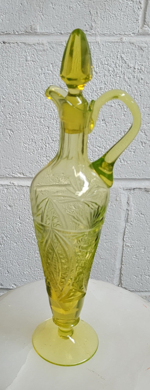 Stunning Uranium glass decanter and stopper. Great shape and height of 30.5cm