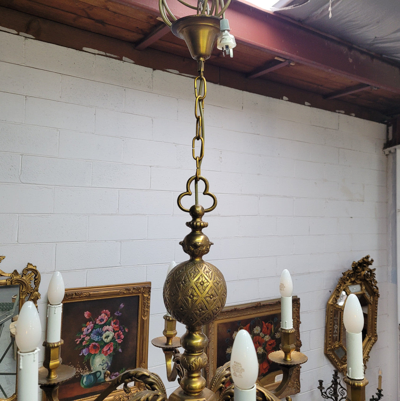 Stunning six arm French bronze chandelier. It can be used with or without shades. It has been fully rewired to Australian standards. It is in good original detailed condition.