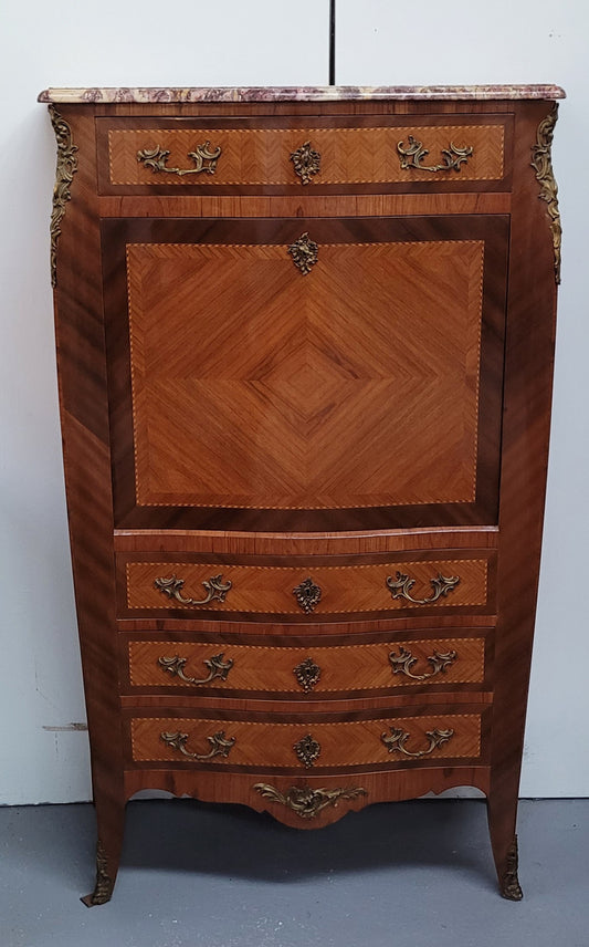 Walnut Louis XV style marble top abbattant with beautiful parquetry inlay and ormolu mounts. It has plenty of storage space with four large drawers and four smaller internal drawers. Beautiful drop down desk with a leather insert. In very good original detailed condition.