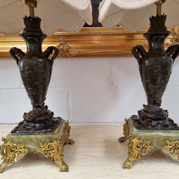 Pair of decorative Antique French gilt bronzed metal and marble table lamps. In good original detailed working condition.