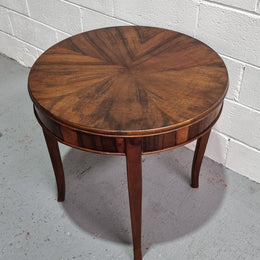 Round Art Deco Coffee Table with veneered top.  In good original condition.