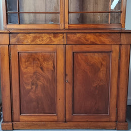 Rare early Australian colonial full Cedar bookcase. Plenty of storage underneath and glass top doors open up too three fully adjustable shelves. In good restored condition.