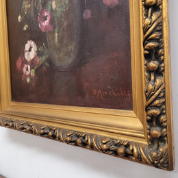 Antique French floral oil on canvas in gilt frame that is signed lower right corner. It has been sourced from France and is in good original detailed condition.