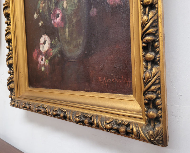 Antique French floral oil on canvas in gilt frame that is signed lower right corner. It has been sourced from France and is in good original detailed condition.