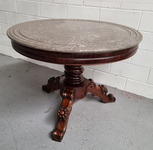 French 19th Century Napoleon III Walnut and marble top centre table. It has been sourced from France and is in good original detailed condition.
