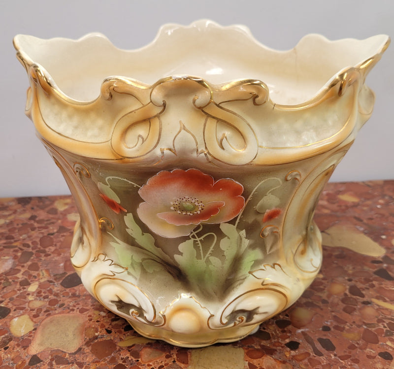 Lovely Antique jardiniere with beautiful poppies in soft pastel colours. Please note that it is being sold in as found condition, please view photos as they help form part of the description.