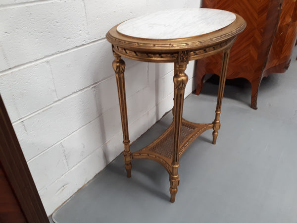 Antique French 19th century Louis XVI style oval inset marble top & giltwood salon/side table. In good condition. Circa 1890.