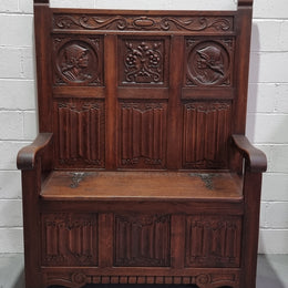 Decorative and nicely carved French Oak 19th Century hall seat with lift up lid for storage. Beautiful details and in good original detailed condition.