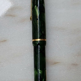 Conway Stewart  "Dinkie" 550 fountain pen green and black marble with 14k gold Nib .