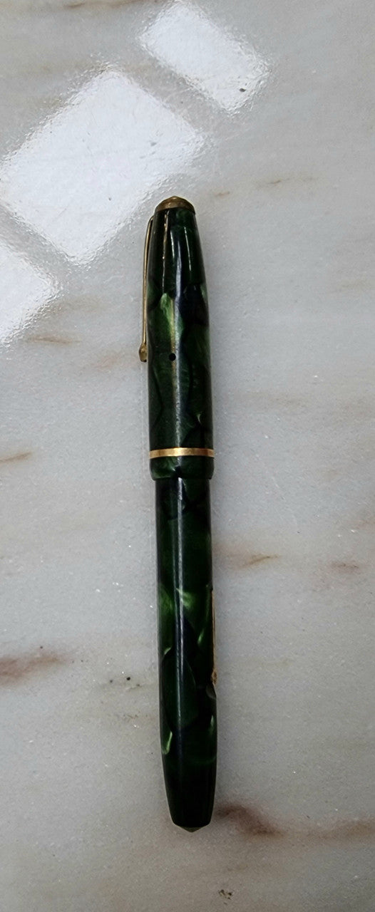 Conway Stewart  "Dinkie" 550 fountain pen green and black marble with 14k gold Nib .