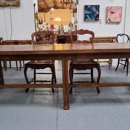 Fabulous French Cherrywood farmhouse dining table with a stretcher base and would easily sit 10 people comfortably in fantastic condition.