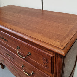 French Provincial Oak chest of three drawers. In good original detailed condition.