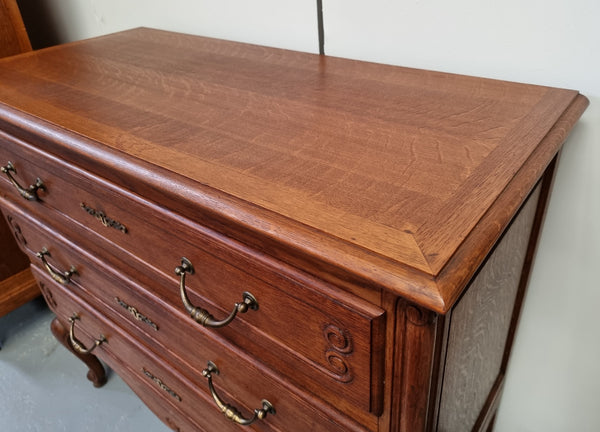 French Provincial Oak chest of three drawers. In good original detailed condition.