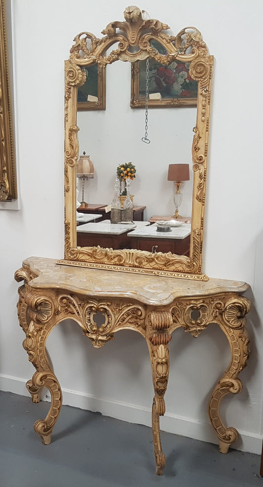 Beautifully carved Italian Rococo style painted console/hall table and mirror. An amazing coloured marble top showing sections of gold veins and is in good condition. Mantle mirror is retaining it's original mirror and showing ages spots.