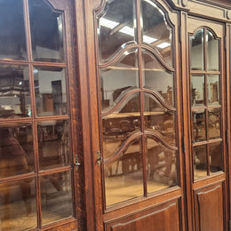 Late 19th Century French Oak three door bookcase. It has fully adjustable shelfs and is in good original detailed condition.