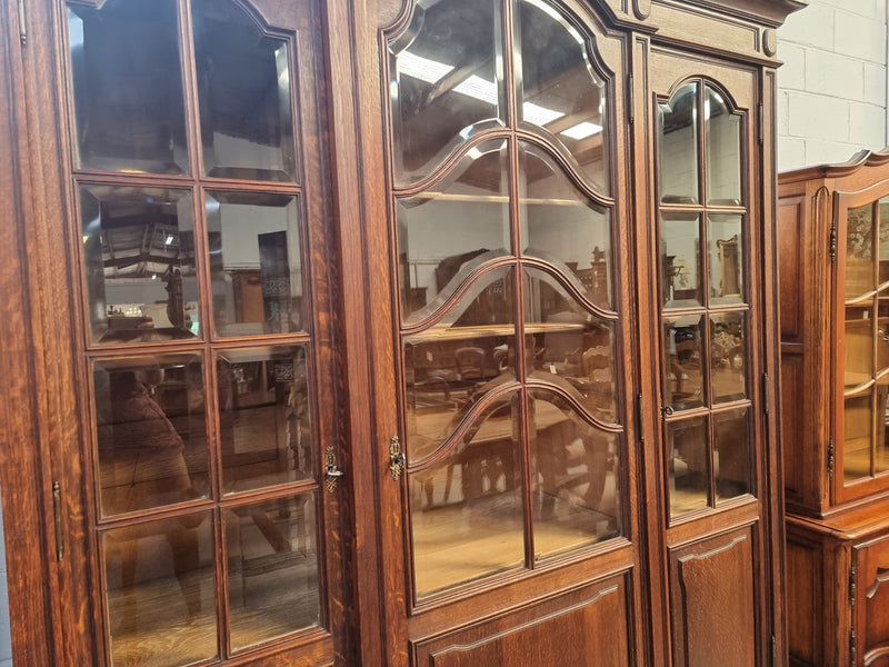 Late 19th Century French Oak three door bookcase. It has fully adjustable shelfs and is in good original detailed condition.